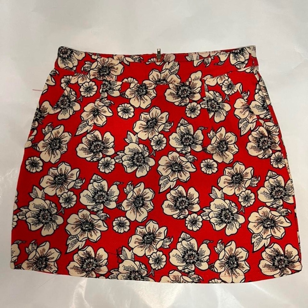 Red skirt with white flowers retro